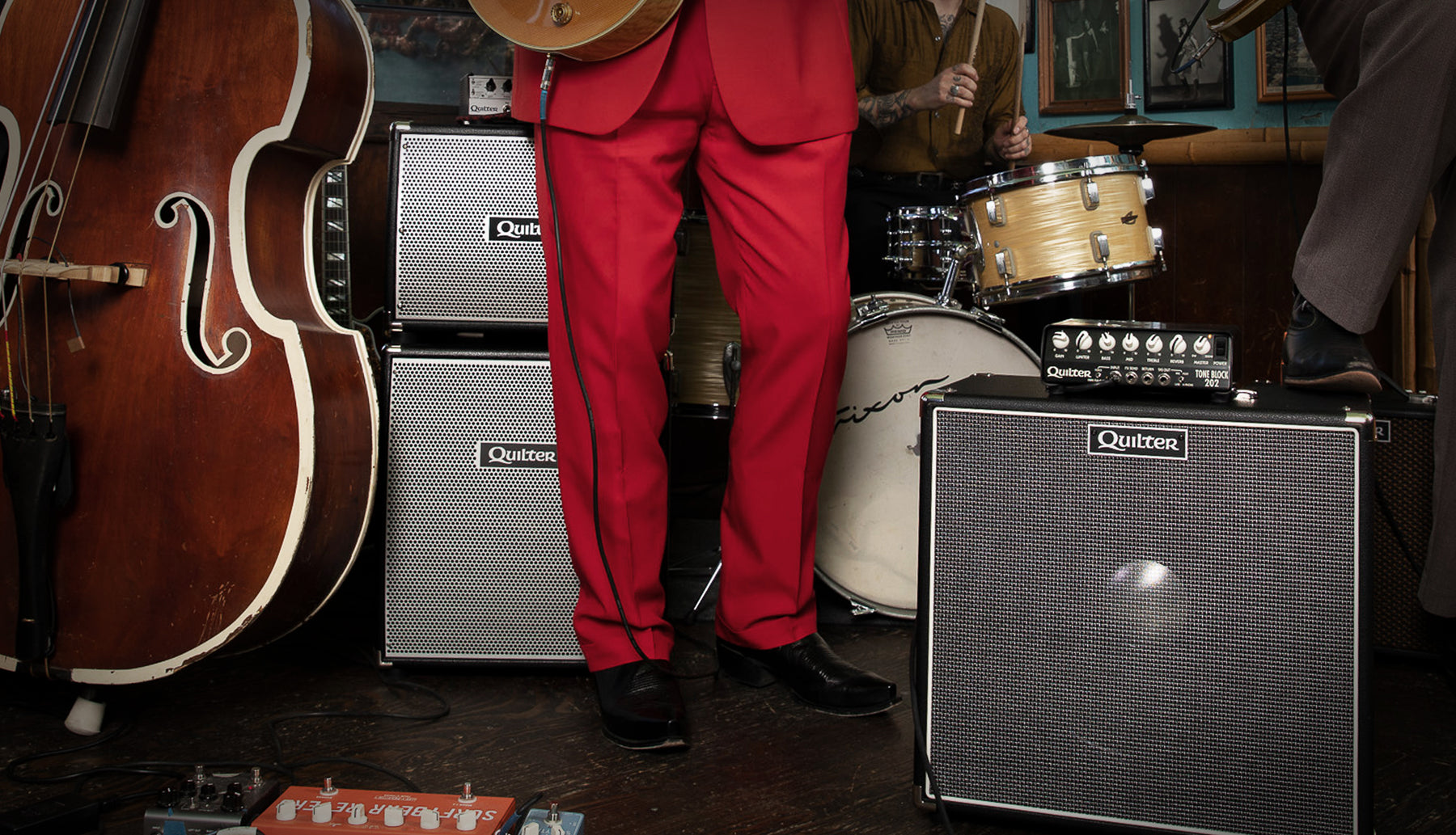 Guitar cabinets on stage with band